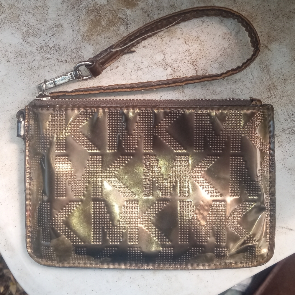 Michael Kors wristlet   *profits from item are donated to help accident victim**